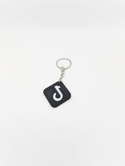 Breloc cu logo TikTok si cip integrat pentru partajare cont si crestere numar de urmaritori.